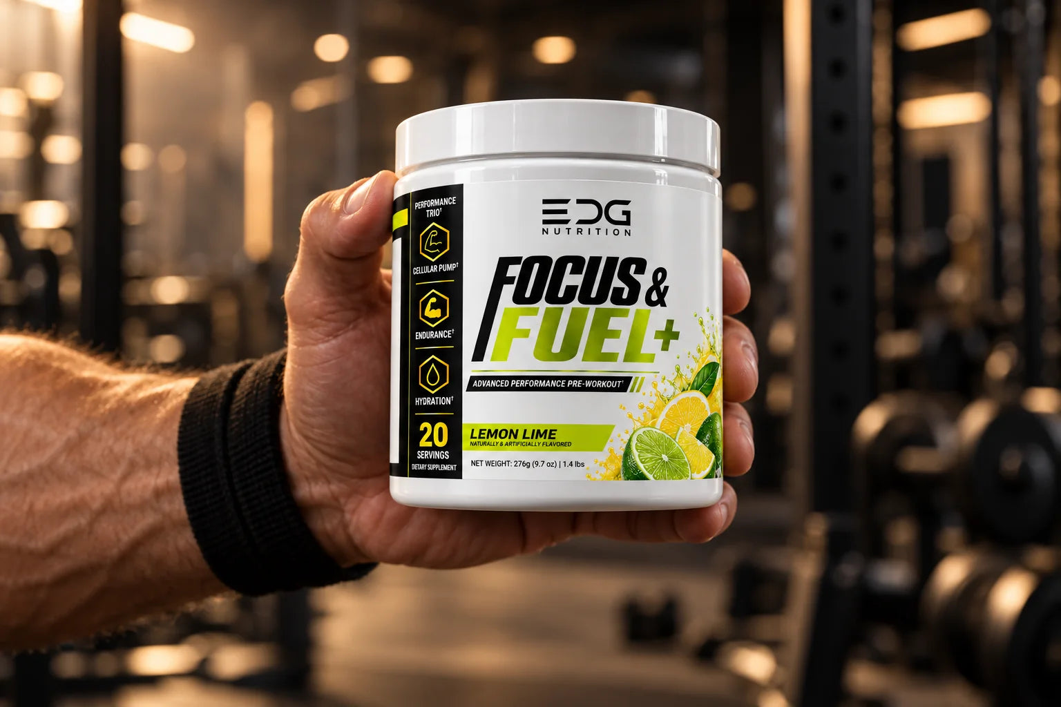 Focus & Fuel+ Lemon Lime held in one hand in the gym